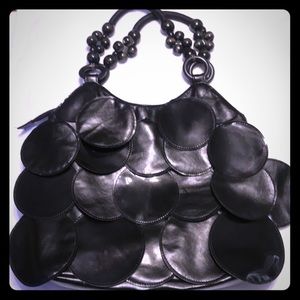 Unbranded manmade material and patent leather